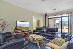 13 Wattle Ave, Dry Creek SA 5094 AT A GLANCE: *5 Bedrooms *3 Bathrooms *Study *Home Theatre *Games Room *In-ground Pool *Open Plan Living *Multiple Car Parking *Living Area approx 297m2 This huge family home is an opportunity not to be missed. Purposely built in 2001 for extended family living in this ever so popular Northern Suburbs District. The floor plan seems never ending, which means there is plenty of space for family and guests alike. Offering a very attractive faade behind a solid built fence with auto gate entry and lovely landscaped gardens. The floor plan is never ending, which means there is plenty of space for family and guests alike. Offering 5 bedrooms plus a study, master with ensuite and walk-in robe, bedroom 2 with walk-in robe, all others with built-in robes. The hub of the home is the fantastic open plan living area comprising kitchen with twin oven and gas cook top, dishwasher, plenty of built-ins including storage cupboards, walk-in pantry and bench space. The adjacent dining and family areas have a combustion heater to keep you warm in those colder months and there is large sliding door accessing the spacious undercover patio/barbeque area. For those movie buffs why not enjoy nights at home in the huge Theatre room, or be a bit more active and head to the games room. Other features include 17kw ducted reverse cycle air conditioning, easy care floor tiling, carpet, rainwater tanks, 5kw solar panels and roller shutters to name just a few. Step outside and you will find a huge verandah overlooking the sparkling in-ground pool, ready for your summer enjoyment, or why not try the adjacent spa/sauna room complete with shower and wc. No parking problems here, as there is a double lockup garage/workshop at the rear, double length carport with roller door and plenty of driveway parking available. All gardens areas are beautifully maintained with plenty of paving, lawn, established palms and plants. As you can see there's something for everyone! Contact the Agent for more details.