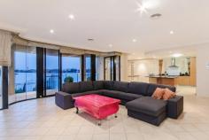 25 Istana View Clear Island Waters QLD 4226 One of Clear Island Waters most spectacular homes, located in a private gated community in the heart of Clear Island Waters. Overseas investor liquidates waterfront mansion. This 80 square home is sprawled over 3 spacious levels and has spectacular northerly views over wide wide water. Ground level features gentleman's study with built in desk, formal and informal dining, bathroom, home theatre, separate family room, chef's kitchen with gas cooking & island bench for entertaining, laundry leading to 3 car garage, with plenty of storage. Second level comprises of 4 spacious bedrooms, 5 bedroom/study & 3 bathrooms. Mastersuite opens onto a large balcony with water views. Third level has a wet bar, built in office & multimedia room, all opening onto a large balcony with the best water views of Clear Island Waters The outdoor entertaining area features, large infinity pool, built in BBQ and large private boardwalk.