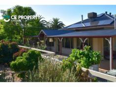 19 Reservoir Rd, Palmer SA 5237 $515,000 This property has it all – a large, family home comprising 4 bedrooms with two separate living areas, a rumpus room, a pool, ample shedding and nearly 50 acres for your animals to roam. Come and enjoy the tranquil setting. LOCATION:- With the back drop of the Eastern Mount Lofty Ranges and views over the surrounding countryside, you will be amazed that you are only a drive of around 15 minutes to Mannum and the River Murray, Mt Pleasant or Birdwood; 30 minutes to Murray Bridge and the South Eastern Freeway; 45 minutes to Gawler, Mount Barker or the eastern suburbs of Adelaide or just under 60 minutes to Strathalbyn or the Barossa Valley. LAND:- Approx. 18.2ha (44.97acres approx.) The property is divided into four paddocks and some smaller holding yards. Approximately 16 hectares are divided into two paddocks and are ideal for cropping out for feed or for grazing as they have a gentle undulation and are able to be accessed via the roads. The house paddock is a sheltered, flat area in front of the home and makes an ideal horse arena. Another paddock on the southern side of the home is planted out to Salt Bush. A winter creek traverses the southern corner and is well shaded by mature gums and other trees. The gardens that surround the home include lush lawns and mature Palms to the east, a gravel area around the pool with a magnificent wall of Oleander bushes providing a screen and colour. On the northern side of the home is an irrigation system, which is set on timers, and raised garden beds make gardening a pleasurable experience. An abundance of fruit trees include dwarf varieties of peach, nectarine, several varieties of citrus, apricots, plums, apples, pear and mulberry. A nature lover’s paradise with several Blue Wrens and other birds making this their home. RESIDENCE:- The original section of the homestead, which was built in stone in approximately 1895, includes features such as – pressed tin ceilings, 11 ft high ceilings, jarrah floor boards, ornate fireplaces and sash windows. This home has been lovingly restored and renovated to now include a huge open plan living area with ample windows that allow natural sunlight to flow throughout the home; this area currently comprises the dining area, a casual sitting area and a large family area with a slow combustion heater. The huge, country style kitchen features two cooking areas – a 900mm gas stove and an electric under bench oven and a cook top; whichever your preference you are well catered for. There are cupboards galore and ample working bench space including a moveable work bench with a stone inlay, which is ideal for pastry. The formal lounge room features a pressed tin ceiling and a slow combustion heater and is an ideal area to relax. The sunroom adjoins the lounge and leads out onto the front verandah and lush lawns, which are shaded by two magnificent palms. Two rooms adjacent to the sunroom are currently used as the third bedroom and an office (or fourth bedroom) with BIR. The main passage leads from the kitchen and past the main bedroom, that has a wall of built-ins, to bedroom two, which features a beautiful ceiling rose. These rooms are on the southern side of the home and look out onto the rear verandah, the entertaining area, to the above ground salt water pool and gardens. Normal wet areas include the bathroom, with a vanity, a bath with overhead shower and a toilet, a separate toilet and an extra large laundry with ample cupboard space and even includes the old copper in the corner. An energy efficient home with wide verandahs on all four sides with many windows and doors that, when opened, allow the natural breeze to flow through the home. In addition, there is year round climate control with the assistance of a ducted evaporative cooling system, ceilings fans, and in the cooler months, two slow combustion heaters and gas bayonet points. A 5.5kW solar system assists with keeping your energy prices down and SA Water is connected to the property. IMPROVEMENTS:- A double carport, adjacent to the double garage, is within close proximity of the home and is alongside the rumpus room, which is fully lined and insulated. Three stables are located within a besser brick building which includes a tack room, feed room and an area that had been used for milking goats and cows – with the original head bails still in place. A concrete area in front of the stables is an ideal wash down or prep area as it is undercover and a rain water tank is just around the corner. A large besser brick implement shed with a concrete floor is adjacent to this area. A small holding paddock with yards and a cattle crush and ramp is adjacent to the main entrance gate. Wood shed, chook pen and a dog run. SUMMARY:- An ideal lifestyle property that has the charm of yesteryear but has all the modern creature comforts that one expects. Room for your family and beloved animals. Come and enjoy the peaceful and tranquil setting.