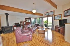 3 Hollydale Pl, Eden NSW 2551 $468,000 Immaculate 3 bedroom split level brick & tile home enjoying a sunny NE aspect in a quiet cul-de-sac location and boasting great views over Curalo Lake, Nth Twofold Bay & ocean. Features include a large open plan living area with raked ceilings and bamboo flooring, wood heater & r/c air con. Well appointed kitchen with pantry, large appliance cupboard & dishwasher. The master bedroom has a walk-through robe to en-suite. built-in robes in 2nd & 3rd bedrooms. The living area opens to a timber deck - enjoying the views at the front and at the rear it opens to a paved undercover courtyard - great for BBQ's. Beautifully landscaped and a fully fenced backyard. Large double remote garage and plenty of storage. Features Deck Courtyard Outdoor entertainment area Fenced Smoke Alarms Ocean views Garage Remote
