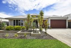 15 Brandalier Turn, Aveley WA 6069 $529,000 - $539,000 This spacious, quality-built Dale Alcock home with its triple garage is looking for a new owner and is located on a quiet Aveley street. With great street appeal and all of the "I Wants" that a family needs, this property is sure to be popular and viewing is a must to appreciate what is on offer. Some of the features of this modern home include: • A large master bedroom with quality fixtures, fitted his and hers robes and direct access to a private courtyard. • The resort style ensuite has double vanities as well as a spa bath. • The kitchen comes complete with Essa stone, a 900mm cooktop and oven, glass splash back, dishwasher, double fridge recess and modern lighting. • The meals and family room are generous in size and there is a separate theatre room with double doors for privacy and the option to install a projector. • The study is close to the front of the house so an ideal space to work from home. • Bedrooms 2, 3 and 4 will hold a queen size bed and have ample robe storage. • The functional laundry room has a triple linen cupboard. • There is ducted reverse cycle air-conditioning as well as a security alarm on offer. • The outdoor entertaining area is substantial with a decked alfresco complete with a ceiling fan and gas point as well as a flat patio. • The triple garage has a roller door to the back gardens enabling easy access. This stunning home has raised ceilings throughout the living area adding to the feeling of spaciousness. With a block size is 666m2 and total property size of 317m2, there is room to move inside and out. Call CLAIRE HUGHES from ER REALTY on 0412 014 336 to view this property today!