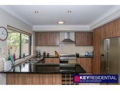 113B Hayes Ave, Yokine WA 6060 $599,000-$619,000 Be quick to view this light and bright spacious family home set in a small group of 3 in popular Hayes Avenue. Featuring 3 large bedrooms, with built in robes, 2 bathrooms and two separate living areas, ducted air con, and boasting a well designed, open plan, family room dining area overlooked by a spacious kitchen with plenty of cupboards, electric oven, gas cooktop and dishwasher this lovely property is bound to impress. Other features include a low maintenance outdoor undercover entertaining area, double lock up garage with shopper access and a tree lined reserve outlook. Located within easy walking distance to a bus stop, local convenience store, restaurants, cafes and the WA golf club this delightful property is to good to miss. Extra Features include: Floorboards, Tiles & Carpets throughout Down lights Ducted Air conditioning Gas Cooking Range hood Built in wine rack Pergola Paved courtyard Rates: $1821.90 PA Water: $1200.00 PA Call MIKE DODEMAIDE on 0414 838 954 for more information.