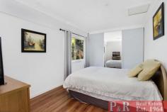 1 Fairview Ave, Roselands NSW 2196 LAND 935 sqm (15.25m frontage) TWO BRICK HOMES ON ONE BLOCK SUIT 2 FAMILIES OR HOME AND INCOME (approx. rental rear home $480-500 pw) FRONT HOME: 5 BEDROOMS. FOUR DOUBLE WITH B/INS HUGE MAIN with ensuite bathroom and walk in Wardrobe. Own balcony. HUGE LIVING AREA (6.5m x 8.2m) LARGE TIMBER KITCHEN with granite benchtops. FAMILY ROOM (4.3m x 5.6m) GYM ROOM with rubber floor. SPIT LEVEL, WITH WROUGHT IRON STAIRCASE up to bedrooms and down to CINEMA ROOM and DOUBLE GARGE (auto door) Fully tiled throughout for easy care. FULLY DUCTED AIR CONDITIONING and LED lights. GREAT partly covered low maintenance ALFRESCO area ideal for entertaining and all beautifully paved and landscaped. MUST BE SEEN TO BE APPRECIATED. HOME AT REAR: OPEN PLAN WITH TWO HUGE BEDROOMS. HUGE LIVING AREA (5.5m x 6.5m) ATTRACTIVE TIMBER FLOORS . ALL LOW MAINTENANCE. FULLY DUCTED AIR CONDITIONING WITH 2 ZONES Car space, Internal laundry. Storage shed SEPARATE gas and power meters. Covered outdoor area for entertaining.