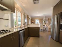 115 Oats St, Carlisle WA 6101 END DATE SALE all offers presented 17th April 2018 Conveniently located this beautifully presented as new home has so much to offer for your family, custom built in 2007 with all the modern finishing’s a 4 bedroom 2 bathroom home should have. As you enter through the front gate you will be impressed by the mature manicured gardens and trees, the portico and double front doors. Greeted in the entry hall and through the tiled family, dining and theatre room you will be impressed by the light and space in this living area. The functional centrally located modern kitchen with all its facilities includes gas plates, electric oven, dishwasher, a walk in pantry and plenty of counter space, this downstairs area is light filled and very spacious and has easy flow through to the covered outdoor alfresco area to comfortably fit your family and friend all year round. Property features as follows; • 4 Bedrooms, 2 Bathrooms 2 WC + Powder Room • Central Theatre Room • Chef’s Kitchen Lots bench space and breakfast counter • gas hot plates electric oven dishwasher walk in pantry / Breakfast Bar • Large Open Living and Dining rooms with tiled floors and access to covered courtyard • Laundry room with walk-in linen press • Window treatments including Drapes in dining and family room • Light fittings • Reverse Cycle zoned ducted Air Conditioning • Alarm System • Front Fence intercom and Electric Vehicle Gate • Large Alfresco • Fully Landscaped and Reticulated Mature Gardens and hedges • Double Garage and 2 Storage Areas. • Brick and Tile construction • Large Master bedroom, WIR, ducted air conditioning, ensuite. • Bedroom 2 has BIR Window Treatments, ducted air & carpeted • Bedroom 3 has BIR Window Treatments ducted air & carpeted • Bedroom 4 has BIR Window Treatments ducted air & carpeted • Dble garage and extra for storage plus store room under home • Auto Reticulation • Brick paved gated and secure driveway • (5.3 km) to Optus stadium • (5.5 km) to Curtin university • (4.0 km) to Burswood casino inspections by appointment with Michael Martino 0417474105 michael@martinopg.com.au