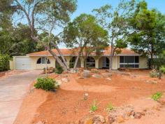 3 Pipers Pl, Kalamunda WA 6076 $579,000 This lovely hills 4 bedroom 2 bathroom home is not your everyday conventional floor plan, and is conveniently made up of two homes in one, comprising of a spacious main residence of a 3 bedroom 1 bathroom home with a 1 bedroom 1 bathroom granny flat with its own entrance. Ideally situated in quiet cul-de-sac, the tranquil home is perfectly positioned across the road from Mundy National Reserve. This lovely property takes advantage of a large 1009sqm block creating the perfect tree change environment. This solid home was originally built in 1973, and has been given a new lease on life with modern renovation, lightening the colour palette of the floors and walls showing how truly spacious this home really is. All of the queen sized bedrooms are located along one wing of the home. They all have a large window letting in lots of the natural light and ample storage with a massive 3 door wardrobes along one entire wall. The kitchen is the central hub of the home, and although this one still contains some of its original decore, if left a few more years, it may just come back into fashion. If not, it is extremely functional with plenty of bench space, below bench cupboards and some overhead cupboards, dishwasher, gas cooker, electric oven and the perfect outlook over the pool and entertaining area. There are two main living areas in this home which can each be sectioned off to provide privacy when required. To the front of the home is a spacious sunken lounge/theatre room which steps up to a formal dining room. The second is an open plan family and meals room, which conveniently feeds off the kitchen, the slow combustion wood heater provides ambience and warmth throughout the colder months. This home is the perfect place all year! The meals area allows you direct access out to the large paved out door entertaining area, the gardens require minimal work and has been designed to highlight the sparking below ground pool. Its the perfect place to gather with family and enjoy the surrounds. The 1 bedroom granny flat has two external doors one at the front and one to the rear providing access out to the entertaining area. This studio room is light and bright with lots of windows for natural lighting. There is a wardrobe, split system air conditioner and ensuite. So whether you have a large family, extended family, teenagers, older parents, guests or maybe you are looking at investing or earning some extra income, then this property is just what you have been searching for. There is undercover parking for one car with drive through rear access, the drive way is horse shoe shaped and there room to park additional cars. Living the hills life truly is superb with Kalamunda Town Centre with its various shops, cafes and restaurants all in close proximity, together with other amenities, lawn bowls, tennis courts, the Kalamunda farmers’ market, the Bibbulmun Track and other walking trails. There is also nearby access to public transport, and with the major transport links being nearby, travelling to Perth, Midland or even the Airport is extremely accessible. Call Simon to view this amazing property today. 3 Bedroom 1 Bathroom main Dwelling Plus 1 Bedroom 1 Bathroom Granny Flat Spacious Lounge/Theatre Room Formal Dining Room Kitchen, Family and Meal Area Split System Air Conditioning Slow Combustion Wood Heater CCTV Security System Sparking Below Ground Pool Easy Care Terraces Gardens Tranquil Setting Across From Reserve Convenient Kalamunda Location Built in 1973, Massive 1009sqm Block Features Air Conditioning Alarm System Built-In Wardrobes Close To Schools Close To Shops Close To Transport Fireplace(s)