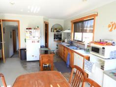 20 Cherrywood Dr Scamander TAS 7215 $365,000 (1817m2) This home sits within walking distance of the beaches, river, shops, hotel, post office, fishing, surfing and most of Scamander’s facilities. Upstairs offers 3 good sized bedrooms all with built-ins and the main with an ensuite, walk-in-robe, ocean views and deck access. The living and dining area flow into each other and offers great space and deck access from both the dining and living areas. The main bathroom is spacious and has a spa bath, separate shower and timber vanity. Stairs lead to a very large rumpus/ games room or 4th bedroom. This area has its own toilet and vanity, there are also 2 other utility rooms that run off the rumpus room. This area would be perfect for a teenager retreat or guest area. With some work it could be self-contained as it has its own access. There is also a double garage with carport at the rear of the property. All this sits on a large 1817m2 block with great established fruit trees and plenty of space for your boat or caravan. Good value here!