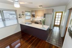 19 Campbell St Scarborough QLD 4020 $449,850 Chamferboard Charmer! This thoroughly charming post-war home will absolutely delight…character-filled with a blend of old-world ambience and new-world comforts, this will please those who appreciate a home with great heart and soul. All on one level for ease of maintenance and functionality; the home is complete with three bedrooms, stylish modern kitchen and bathroom, light-filled north facing sunroom at front, separate living and dining, separate tiled laundry, huge covered timber deck at rear, double carport, and separate powered shed/workshop in backyard, on an easy care 405m2 block with a child/pet friendly fenced backyard. Features that enhance warmth and appeal include: stunning hardwood timber floors and ornate plaster cornices; there is also air-conditioning and ceiling fans, and with a contemporary kitchen with dishwasher, and bathroom there are no big-ticket items to spend money on. The alfresco deck is a superb place for those weekend social gatherings…fire up the BBQ, chill the drinks, select your tunes, and invite around family and friends for laughter, good food and great company – many memories have been made on this back deck, and there are many more waiting to be made in coming years. Located within walking distance of the local primary school, parks, bus stops, cafes, and the Scarborough foreshore; this is a wonderful location for sea-changing downsizers or entry level buyers who are looking to embrace a relaxed Bayside lifestyle. Only 2.4 kilometres to Redcliffe and 30 kilometres to Brisbane – access to major urban amenities is relatively effortless, particularly via public transport. This truly is a cutie with lashings of appeal; if you are an aficionado of homes of this vintage, you will find this one…simply irresistible. Contact us to arrange your very own private inspection today. Open 7 days Phone 07 3203 6001 (24 Hours) OUR FAVOURITE FEATURES : • Post-war charm & character with modern comforts • 3 bedrooms, 1-bathroom • Stylish contemporary kitchen with dishwasher • Separate dining, separate living, light-filled sunroom • Huge rear deck for alfresco entertaining & relaxing • Stunning hardwood timber floors, ornate cornices • Air-conditioning, ceiling fans, double carport • Lock-up powered shed at rear, perfect man-cave • Child/pet friendly 405m2 easy care block • Walk to beach, shops, cafes, bus, local schools • Suit entry level buyers, downsizers & sea-changers!