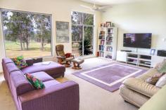 161 Coney Creek Ln Quorrobolong NSW 2325 $1,080,000 - $1,180,000 Situated on one of the most private 5 acre parcels in Quorrobolong Valley, this executive designer residence has been purposely built to capture enchanting views of the Watagan State Forrest. Modern open plan living is the order of the day, with hardwood timber flooring, raked ceilings and abundant use of sizable glass windows to allow for captivating mountain views from every advantage point. As one would expect from a home of this calibre on the upper level there are 4 bedrooms with a vast amount of space, an ensuite and walk in robe off the main, expansive 3 way main bathroom, as well as a modern kitchen with stainless steel appliances perfectly positioned for entertaining, accompanied by stone benchtops and plenty of storage. Flowing off the living and dining room is a huge fully covered merbau deck allowing for year-round entertaining as well as accessing and overlooking the 12m in ground pool. On lower level you will be privileged to host your family and friends in the purpose built media room, which contains one of the best in home cinema rooms we have ever seen. This level also contains a garaging area suitable for vehicles, boats or machinery as well as plenty of extra storage and a perfect spot for your future wine cellar. With established gardens and lush yard space offering selectively cleared and open pockets as well as timber surrounding the boundaries creating a private sanctuary for the home, this property is perfect for anyone looking accommodate a horse or two. Ideally situated in a very tightly held area in Quorrobolong and only 1.5 hours to Sydney, 1 hour to Central Coast and Newcastle and 25 minutes from all of Pokolbin’s various attractions. If you are in the market for a perfect established family home, tree change or prized weekender designed to impress. We invite you to contact Heath or Ben for a suitable time to inspect.