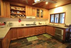 31 Old Home Hill Rd Ayr QLD 4807 $385,000 Neg What are you waiting for? This beautiful lowset 3 bedroom split block home is situated in a sought after quiet location in Ayr and is waiting patiently for you & your family to call her "Home". Positioned perfectly on a fenced 1702m2 block & offering everything possible to each & every member of your family. Venture inside & enjoy the layout & generous space within. Enviable in size the kitchen brags heaps of bench prep & storage. Big tiled dining with built-in bar & a very cozy airconditioned living area. All 3 bedrooms are airconditioned with built-ins & conveniently located near the bathroom amenities. Big tiled laundry with storage & so much more. A massive tiled, fanned, security screened BBQ/Entertaining area will blow you away as social gatherings with friends & family will surely be a constant occurrence. Big lush backyard with handy storage shed, bigger than usual garden shed. Front & back irrigation & pump & bore to keep it that "Magic" shade of green. Undercover parking is available for 2 but venture further & you will behold a "Colourbond" creation to make hubby happy. This huge shed has an extra height door at front for the caravan/reef boat which has also been partitioned separately & is fully lockable. 2 Roller doors at back & handy side door entry. Its powered & has shelving, storage & mezzanine floor. Wow! 5 kw Solar is available, side greenhouse for the gardener of the family & a front patio to enjoy your morning cuppa. So what are you waiting for? This one has everything & more. Hurry call us today! FEATURES Indoor entertainment area Fenced Verandah Smoke Alarms Safety Switch Sprinkler System