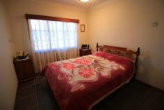 31 Old Home Hill Rd Ayr QLD 4807 $385,000 Neg What are you waiting for? This beautiful lowset 3 bedroom split block home is situated in a sought after quiet location in Ayr and is waiting patiently for you & your family to call her "Home". Positioned perfectly on a fenced 1702m2 block & offering everything possible to each & every member of your family. Venture inside & enjoy the layout & generous space within. Enviable in size the kitchen brags heaps of bench prep & storage. Big tiled dining with built-in bar & a very cozy airconditioned living area. All 3 bedrooms are airconditioned with built-ins & conveniently located near the bathroom amenities. Big tiled laundry with storage & so much more. A massive tiled, fanned, security screened BBQ/Entertaining area will blow you away as social gatherings with friends & family will surely be a constant occurrence. Big lush backyard with handy storage shed, bigger than usual garden shed. Front & back irrigation & pump & bore to keep it that "Magic" shade of green. Undercover parking is available for 2 but venture further & you will behold a "Colourbond" creation to make hubby happy. This huge shed has an extra height door at front for the caravan/reef boat which has also been partitioned separately & is fully lockable. 2 Roller doors at back & handy side door entry. Its powered & has shelving, storage & mezzanine floor. Wow! 5 kw Solar is available, side greenhouse for the gardener of the family & a front patio to enjoy your morning cuppa. So what are you waiting for? This one has everything & more. Hurry call us today! FEATURES Indoor entertainment area Fenced Verandah Smoke Alarms Safety Switch Sprinkler System