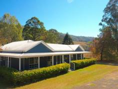 704 Lamington National Park Rd Canungra QLD 4275 Nestled in the foothills of the historical Lamington National Park sits this absolute beauty! Boasting a flat 7.8 acres backing right on to the creek where platypus play, makes this one of the most tranquil homesteads on the market. Freshly renovated inside and out with 4 spacious bedrooms and huge rumpus / entertaining bar area. Both bathrooms have been replaced giving a modern fresh appeal to the house. There is a deck to the front and rear of the property with views on both sides to the ranges. Included in this sensational property is a double garage to securely park your cars. Situated slightly away from the property sits a 1-bedroom granny flat, fully equipped with a kitchen, walk in robe, en-suite and storage. Additional features include pumping from the creek and solar power. If you’re a horse lover or just want plenty of room – this property is sure to impress! Features Air Conditioning Split-System Air Conditioning Deck Fully Fenced Outdoor Entertainment Area Broadband Internet Available Built-in Wardrobes Dishwasher Floorboards Rumpus Room Grey Water System Solar Hot Water Solar Panels Water Tank