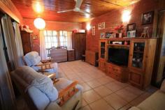 31 Old Home Hill Rd Ayr QLD 4807 $385,000 Neg What are you waiting for? This beautiful lowset 3 bedroom split block home is situated in a sought after quiet location in Ayr and is waiting patiently for you & your family to call her "Home". Positioned perfectly on a fenced 1702m2 block & offering everything possible to each & every member of your family. Venture inside & enjoy the layout & generous space within. Enviable in size the kitchen brags heaps of bench prep & storage. Big tiled dining with built-in bar & a very cozy airconditioned living area. All 3 bedrooms are airconditioned with built-ins & conveniently located near the bathroom amenities. Big tiled laundry with storage & so much more. A massive tiled, fanned, security screened BBQ/Entertaining area will blow you away as social gatherings with friends & family will surely be a constant occurrence. Big lush backyard with handy storage shed, bigger than usual garden shed. Front & back irrigation & pump & bore to keep it that "Magic" shade of green. Undercover parking is available for 2 but venture further & you will behold a "Colourbond" creation to make hubby happy. This huge shed has an extra height door at front for the caravan/reef boat which has also been partitioned separately & is fully lockable. 2 Roller doors at back & handy side door entry. Its powered & has shelving, storage & mezzanine floor. Wow! 5 kw Solar is available, side greenhouse for the gardener of the family & a front patio to enjoy your morning cuppa. So what are you waiting for? This one has everything & more. Hurry call us today! FEATURES Indoor entertainment area Fenced Verandah Smoke Alarms Safety Switch Sprinkler System