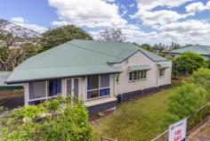 14 Majestic Outlook Seven Hills QLD 4170 After 36 years ownership the current owners have decided to offer their Family home to the market Currently tenanted until June 2019 at $480 per week Master bedroom has large en suite plus reverse cycle Air con Air con to large dining / kitchen Covered deck with city glimpses to rear of property Large 10,000 water tank to side of property Post war home on 736 sq m with Frontage of 26.4 meters All this in such a convenient location 170 Meters walk to a City bus 700 Meters to local Primary school 1200 Meters to City Train 4 Kilometers to Church of England Grammar School 8 Km to Brisbane City 16 Km to Brisbane Airport A great site to develop your new home with City Views or just enjoy what is already here