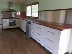 6 Bundesen Ave Midge Point QLD 4799 $240,000 ALL OFFERS CONSIDERED AT $240,000 ITS A BARGAIN The home consists of 2 bedrooms, master has air conditioning, and a generous bathroom, a very roomy kitchen that has Jarrah slab timber bench tops and stylish splash backs. A 4 burner gas cook top, a separate oven and dishwasher compliments the kitchen Living and dining area is open plan and is air conditioned. Car and toy accommodation is catered for with a double carport and a 9 mt x 6 mt garage. The entire 2000 m2 allotment is fenced utilising 4 strand wire and Rosewood posts. Town water & septic The property is a couple of minutes to the beach. A school bus services the area for Bloomsbury primary and Proserpine high schools. Approx 18 minutes to Whitsunday Coast Airport. 25 minutes to Proserpine and 40 minutes to Airlie Beach, the Gateway to the Great Barrier Reef. I hour to Mackay & Bowen. What more could you want. This home is an absolute must to inspect. Contact Terry McMullen on 0408 760 994 for more information or your private appointment to view.