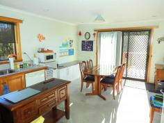20 Cherrywood Dr Scamander TAS 7215 $365,000 (1817m2) This home sits within walking distance of the beaches, river, shops, hotel, post office, fishing, surfing and most of Scamander’s facilities. Upstairs offers 3 good sized bedrooms all with built-ins and the main with an ensuite, walk-in-robe, ocean views and deck access. The living and dining area flow into each other and offers great space and deck access from both the dining and living areas. The main bathroom is spacious and has a spa bath, separate shower and timber vanity. Stairs lead to a very large rumpus/ games room or 4th bedroom. This area has its own toilet and vanity, there are also 2 other utility rooms that run off the rumpus room. This area would be perfect for a teenager retreat or guest area. With some work it could be self-contained as it has its own access. There is also a double garage with carport at the rear of the property. All this sits on a large 1817m2 block with great established fruit trees and plenty of space for your boat or caravan. Good value here!