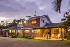 36 Langbeckers Rd Thabeban QLD 4670 GRAND ONE-OWNER RESIDENCE…2.5 ACRES ON THE CITY FRINGE!! This magnificent grand residence offers a country lifestyle in a stunning picturesque setting, yet just 6.8km to Bundaberg’s CBD. Sprawled out over 2.5 manicured acres with quality drinking bore water, the well-designed split level layout provides a plethora of intimate areas, allowing the larger families to still find comfort in their very own space. The home’s grand north facing façade, grabs your attention from the roadside, as you enter via a large horse-shoe driveway. Designed to flow freely from space to space, the large kitchen complete with a walk-in pantry is very central, combined with a dining space, two massive living rooms showcasing a classy built-in liquor cabinet & a large formal dining, easily converted into a lower level bedroom. Easily accessible is the laundry, main bathroom & in through the single lock up garage, is your very own office space. The upper level hosts three very generous size bedrooms all with built-in cupboards, ceilings fans & the master with a/c. A separate built-in utility room, ideal for storage or as a private study room for the teenagers. The bathroom is large enough to throw a party, complete with a massive bath tub/shower & vanity. Heading outdoors, there is a tiled patio right the way across the back of the home for entertaining, a private setting with a beautiful bushland aspect across the back of the block. And not far from the residence, you will be able to accommodate any machinery, weekend toys or your everyday vehicles, in the 16m x 10m steel frame shed – with up to 8 secure spaces as well as a workbench. The rear of the block has some beautiful established trees, a nice place to walk the dogs of a summer evening. Embracing privacy whilst providing a quality lifestyle, this uniquely designed residence comes with all the extras needed for convenient acreage living. It will meet the needs of every family, no matter how big or small. With abundant living spaces focused on light, flow and openness, there is a place for everyone in the family to enjoy. With the owners ready to hand over the keys to their home, since they designed & built many years ago, a wonderful chapter of their life closes & a new one begins – this is a very rare opportunity to make this special property your very own. Features Air Conditioning Built In Robes Dishwasher Outdoor Entertaining Secure Parking Shed