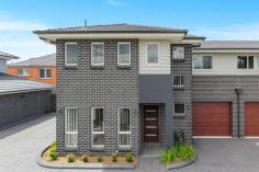 2/40 Gerongar Cres Haywards Bay NSW 2530 $540,000 to $590,000 Boasting modern luxury and sophisticated design, this executive style 3 bedroom townhouse is a must to inspect. Effortless comfort is assured with spacious living zones and entertaining is a breeze, inside or out, with the designer kitchen and tranquil alfresco dining area. The up-stairs bedrooms are of an impressive size, the main suite features a walk in robe and ensuite, all centred around the beautiful bathroom and study nook. A sense of warmth and luxury is provided by the Spotted Gum faux- timber floors and ducted air conditioning throughout. Other features include a single remote garage with internal access, downstairs powder room, garden shed and security alarm. Surrounded by quality homes and set in the Illawarra's premier estate don't miss this rare lifestyle opportunity. FEATURES: Air Conditioning Built-In Wardrobes Close To Shops Close To Transport Garden Secure Parking