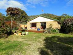 21384 Tasman Hwy Four Mile Creek TAS 7215 $565,000 This property presents the perfect opportunity to enjoy the very best of living that seachange lifestyle. Sitting on a private and beautifully designed acreage that has an 80 meter “right of way” to the stunning waterfront foreshore reserve for your morning walks, swimming, fishing or just sitting and watching the whales go by. Currently operating as a sculpture park and open studio incorporating 3 acres of fully fenced park like gardens, visitors from all around the world have delighted at the peace and tranquillity this unique property has to offer. The house offers 3 bedrooms, the main with ensuite, spa, ocean views and WIR. The living area gives a warm rustic feel with lovely filtered water views. The kitchen/dining areas are spacious and lead into the living room and onto a decked area for your morning coffee. There is a spacious 2nd bathroom with shower and bath. The property has an excellent chalet that is currently used as an artist’s studio but could be guest accommodation if required. There is also a workshop, several other outbuildings, established vegetable gardens and numerous designated areas ideal for entertaining or relaxing. This property is ideal for someone looking for a private seachange where you are totally secluded from the view of your closest neighbours. This one presents everything you could want from a small coastal acreage. Good sun, great privacy, dam, low maintenance landscaped grounds and most of all access to the wonderful foreshore for sunrises, full moons, bird and whale watching, daily walks and just enjoying the beautiful clean sea air. Situated between Bicheno and Scamander this one is ideally located in one of the East Coast’s premium coastal regions and give you a chance to secure your piece of Tassie with all the waterfront benefits.