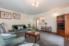 360 Summit Road, Mundaring, WA 6073 $719,000 Everything is in place to ensure you make the most of life on this 1-acre property. A wonderful, large 4 bedroom, 2 bathroom home with open plan living, generous bedrooms, a spectacular high-gabled paved alfresco with views of lawn and formal gardens and a fabulous 3-phase powered workshop. 4 bedrooms 2 bathrooms 1996-built brick and iron Vast open kitchen, living Large sunken loungeroom Sunny, airy studio / study Gorgeous jarrah benchtops Spectacular alfresco living Scheme, tank, bore water 1-acre, 3 phase workshop Minutes from Mundaring Generosity – room to move, play, grow, learn and work – infuses this home. Ideally placed, in every way, moments from the Mundaring Village, within easy reach of transport links, a choice of schools and arterial roads, this elegant 4 bedroom, 2 bathroom home, sits in a landscaped garden with a backdrop of gorgeous native vegetation and is sure to suit your family now and into the future. A circular drive surrounds a planting of citrus, herbs and an ornamental pear tree to create a striking first encounter. The home sits elegantly at the centre of the property – back from the road and elevated. An enclosed carport with roller door is arranged to one side of the home. A stain-glassed entry opens to a sunken lounge with views of rose bushes and the native landscape. A wonderfully restful space, generous proportions and plush carpets, perfect space for quite evenings at home or formal entertaining. Step up from the lounge room to the bright studio space. With French doors to the northern verandah and windows to the west, this room is an ideal workspace for artists and crafters. The spacious master suite, features a walk in robe, patio access, and a big, bright ensuite with a storage alcove. An impressive open plan kitchen / family room is incredibly comfortable and inviting thanks to warm-toned slate floors and gorgeous solid jarrah bench tops. A slow combustion fire, ceiling fan and high ceilings reinforce the feeling that this is a space designed to be the centre of family life. The kitchen contains a free standing 900mm Emilia oven, dishwasher, walk-in pantry and ample storage. The wide bench top forms a long breakfast bar and large windows wrap the corner of the room to deliver views of the gorgeous surrounds. Along the eastern side of the home is an impressive 9.2m x 6m paved, alfresco terrace. Covered by a high-gabled roof, the views of the garden, lawn and curved sandstone walls produce a restful and beguiling outdoor living area. The open plan family room leads to the junior wing, which includes two large bedrooms with built-in wardrobes, that offer views to the alfresco terrace and a third bedroom or study room. A large family bathroom with bathtub, separate shower and vanity is arranged with a separate W.C adjoining the walk-through laundry. Follow the lawn, past the wisteria and along the sandstone garden walls to reach the large, shed with 3-phase power. Vehicle access and a turning circle make for a practical workshop, double sliding doors, a side entrance and a bathroom with separate septic system ensure this approximately 15 m x 8 m space is adaptable to many uses. Beyond the property’s rear boundary is a wildlife corridor and bridle trail. A perfect balance of garden, bushland views and outdoor living, the landscaped gardens host established fruit trees, ornamental blossom trees and rose bushes. Set against a background of native vegetation, the effect is enchanting and wonderfully Australian. Maintaining the garden is made easier through the use of a reticulated bore and 43K litre tank. Generous, bold, yet unpretentious, the spacious home offers stylish living. Solid family-ready fixtures and high end finishes give a sense of enduring quality. Solar panels, established gardens, ducted evaporative cooling, bore water and proximity to Mundaring Village support a sustainable lifestyle for years to come.