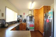 11 Alexandra St Toogoolawah QLD 4313 $269,000 - Perfect location, less than 100m from the local golf club - Open plan country style timber kitchen with dishwasher, large pantry and gas cooking - Air conditioning in kitchen/ dining room - Separate formal living room with fireplace and air conditioning following out onto a large entertaining deck - Timber floors throughout - 3 bedrooms (2 with air con) - Modern bathroom - Large laundry with second toilet located on the back patio - Concrete driveway with double carport at the front of the home including side access to the backyard - 6m x 9m 3 bay shed with power (2 bays have been converted into a teenagers retreat with air conditioning) - 2.5m x 3.5m garden shed - Gas hot water - 1,000 gal rain water storage - Fully fenced backyard, ideal for children & pets - Concrete stumps - Storage & dog kennel facility under the home with power & lights - NBN This one is certainly worth the inspection! Call today to book your private viewing. FEATURES: Air Conditioning Close To Schools Close To Shops Fireplace(S) Garden Polished Timber Floor Terrace/Balcony