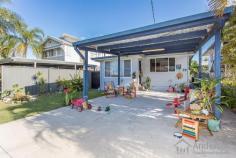19 Campbell St Scarborough QLD 4020 $449,850 Chamferboard Charmer! This thoroughly charming post-war home will absolutely delight…character-filled with a blend of old-world ambience and new-world comforts, this will please those who appreciate a home with great heart and soul. All on one level for ease of maintenance and functionality; the home is complete with three bedrooms, stylish modern kitchen and bathroom, light-filled north facing sunroom at front, separate living and dining, separate tiled laundry, huge covered timber deck at rear, double carport, and separate powered shed/workshop in backyard, on an easy care 405m2 block with a child/pet friendly fenced backyard. Features that enhance warmth and appeal include: stunning hardwood timber floors and ornate plaster cornices; there is also air-conditioning and ceiling fans, and with a contemporary kitchen with dishwasher, and bathroom there are no big-ticket items to spend money on. The alfresco deck is a superb place for those weekend social gatherings…fire up the BBQ, chill the drinks, select your tunes, and invite around family and friends for laughter, good food and great company – many memories have been made on this back deck, and there are many more waiting to be made in coming years. Located within walking distance of the local primary school, parks, bus stops, cafes, and the Scarborough foreshore; this is a wonderful location for sea-changing downsizers or entry level buyers who are looking to embrace a relaxed Bayside lifestyle. Only 2.4 kilometres to Redcliffe and 30 kilometres to Brisbane – access to major urban amenities is relatively effortless, particularly via public transport. This truly is a cutie with lashings of appeal; if you are an aficionado of homes of this vintage, you will find this one…simply irresistible. Contact us to arrange your very own private inspection today. Open 7 days Phone 07 3203 6001 (24 Hours) OUR FAVOURITE FEATURES : • Post-war charm & character with modern comforts • 3 bedrooms, 1-bathroom • Stylish contemporary kitchen with dishwasher • Separate dining, separate living, light-filled sunroom • Huge rear deck for alfresco entertaining & relaxing • Stunning hardwood timber floors, ornate cornices • Air-conditioning, ceiling fans, double carport • Lock-up powered shed at rear, perfect man-cave • Child/pet friendly 405m2 easy care block • Walk to beach, shops, cafes, bus, local schools • Suit entry level buyers, downsizers & sea-changers!