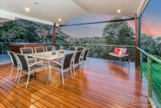 9 Pinbarren Place Yugar QLD 4520 $1,249,850 Only 5 Minutes Into Samford Village! Why buy then build when all the work has already been done here for just a fraction of the cost? This secluded stunning split level family home, nestled amongst five acres of pristine countryside, is the perfect property for those seeking a semi-rural lifestyle with all the convenience of modern living. Elevated and situated to take in the natural beauty of the surrounding mountains and valley, the home is spacious and ideal for either dual living or work from home arrangements. Offering four bedrooms all with built in robes, plus a study/office, three bathrooms and features a voluminous, light-filled open plan kitchen/living design leading out onto the impressive timber deck. Downstairs accommodates a large rumpus, as well as a games room complete with bar, ample workshop space and separate storage room. The property is complete with remote double lock up garage, plus single carport facility. Perfectly presented features include: fabulous entertainers kitchen with 180 degree views of natural surrounds and complete with quality European appliances and raked ceiling, an abundance of glass offers light-filled spaces, polished hardwood timber floors, carpet in bedrooms, ducted reverse cycle air-conditioning throughout, king sized master suite offering tree top views, walk-in robe, ensuite and access to deck. Grand double fronted portico entry, second covered entertaining area complete with granite benches, sink and power. This property provides plenty of space to relax and unwind. Surrounded by so much natural beauty, you’ll enjoy quiet mornings sitting back with a cuppa and taking it all in on the expansive deck and on warm summer evenings, entertain family and friends in your private seclusion. The property also features secure electric gate access upon entry, bitumen driveway with plenty of extra parking, fully-fenced block, power and water to back of the property, 90000L water tank and bio-waste management system. Located just 5 minutes from delightful Samford village with its schools, shops and cafes, and only 35 minutes’ to Brisbane CBD, this property offers the best of both worlds. Properties such as this are in high demand and hard to come by! Contact us to arrange your very own private inspection today. Open 7 days Phone 07 3203 6001 (24 Hours)