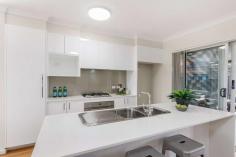 2/40 Gerongar Cres Haywards Bay NSW 2530 $540,000 to $590,000 Boasting modern luxury and sophisticated design, this executive style 3 bedroom townhouse is a must to inspect. Effortless comfort is assured with spacious living zones and entertaining is a breeze, inside or out, with the designer kitchen and tranquil alfresco dining area. The up-stairs bedrooms are of an impressive size, the main suite features a walk in robe and ensuite, all centred around the beautiful bathroom and study nook. A sense of warmth and luxury is provided by the Spotted Gum faux- timber floors and ducted air conditioning throughout. Other features include a single remote garage with internal access, downstairs powder room, garden shed and security alarm. Surrounded by quality homes and set in the Illawarra's premier estate don't miss this rare lifestyle opportunity. FEATURES: Air Conditioning Built-In Wardrobes Close To Shops Close To Transport Garden Secure Parking