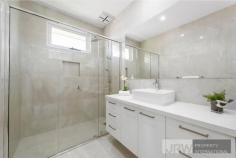 2/17 Lee Avenue Mount Waverley VIC 3149 Brand New Townhouse with Suburban Convenience Stunning contemporary design featuring spacious comfort, high ceilings, quality timber floors, tall windows, luxury fittings and a relaxed yet convenient lifestyle are the hallmarks of this sensational, brand new two level townhouse. Positioned in an enviable location within the Mount Waverley Secondary College School zone, this gem is literally metres to buses, trains, shops and eateries. Light filled, this double storey haven impresses with a generous lounge and dining zone along with a state of the art stone kitchen with stainless steel gas appliances, 5 burner cooker, deluxe window splash back, and an island bench with a dishwasher. The front study can be converted into an extra bedroom, offering options for a relaxing change of pace or a perfect spot to hustle and get things achieved. Neighbouring is a gorgeous lower level suite with a walk-in robe and a divine shower ensuite, while the upper master is spacious with a walk-in robe and ensuite and two further bedrooms with built-in robes. A pristine central bathroom boasts wall-to-wall shower and floating vanity and two powder rooms are a true treat. With fantastic outdoor entertaining options including an easy-to-manage courtyard and sun-drenched alfresco patio. This striking residence also comprises of a delectable sitting area, a large storage room under the stairs, a laundry, ducted heating, evaporative cooling, ducted vacuum and double remote garage with internal entry. In a superb location only seconds to Syndal train station, family amenities, restaurants, cafes, gymnastics and fitness centres, schools such as Huntingtower School, Wesley College, Mount Waverley Secondary College and Syndal South Primary along with the newly renovated The Glen shopping centre, Kingsway entertainment district and Cinemas.