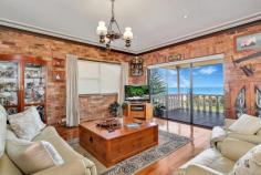 122 NORTH KIAMA DRIVE KIAMA DOWNS NSW 2533 Jones Beachfront - Rare Offering! This is a unique and unparalleled opportunity to acquire a beachfront property on Jones Beach. This five bedroom home has prime position with direct access from your back yard to the sandy shores and rolling waves of the beach. The three level double brick home offers four bedrooms, ensuite and main bathroom on one level, and a fifth bedroom with attached lounge area, kitchenette and bathroom suitable for guest accommodation or valuable self contained holiday accommodation on the lower level. Three of the five bedrooms also enjoy commanding ocean views and outlook. Open plan living, dining and kitchen with breathtaking ocean views and a functional fireplace, are located on the upper level extending out to a sublime alfresco deck. - Beachfront location with direct access and spectacular views - Spacious and solid construction over three levels - Five large bedrooms, three with access to a large balcony and ocean views - Open plan living areas enjoying natural light and a sea breeze - Entertaining bar and fully functioning fireplace - Walk to Kiama Downs shops and Surf Club A very rare offering. Properties of this calibre along Jones beachfront are few and far between. Don't miss the opportunity to secure a piece of this tightly held paradise.