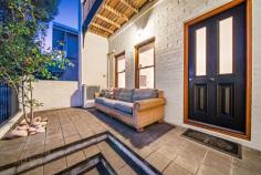 44 York Street Subiaco WA 6008 RENOVATED TERRACE TOWNHOUSE With its classic Paddington terrace style, this stunning renovated townhouse is situated just minutes from the cafe and dining delights of Hay Street and Rokeby Road and within walking distance to the train station allowing quick and easy access to the Perth CBD. Its desirable street front location means pedestrian access to the home is provided via a secure electronic gate with internal control. The home is quietly positioned in one of Subiaco’s quietest streets and boasts an exclusive rear courtyard entertaining area with access provided via double French doors. Internally, the home is finished with classic timber floorboards, high ceilings and a neutral colour palette for broad appeal. There is a sensible layout that offers a spacious open plan living, dining and galley kitchen which has been recently renovated with stone benchtops, stainless steel gas cooktop, built in oven and microwave, integrated dishwasher and ample cupboard space. There is also a separate powder room/ laundry. Upstairs, the spacious master bedroom has a generous walk in robe, ensuite bathroom and access onto the balcony which extends the entire width of the home and overlooks the secure front courtyard. Two additional bedrooms and a sizeable second bathroom are also located upstairs. There is a security alarm, reverse cycle air-conditioning and NBN connection. In addition to two secure, side-by-side car bays and a good-sized secure store room. This street front home has been designed for maximum space and minimal maintenance, ideal for the lock and leave lifestyle!