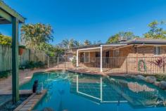 19A Warrina Street Geebung QLD 4034 $679,000 Private Oasis - Park side living! Here is a chance to upgrade your family lifestyle and enjoy the spoils of this unique residence. The flowing open plan design with large living areas will ensure effortless, entertaining and a relaxed lifestyle with direct access to Kath Ballard Park. This brick and tile family home is dominated by a choice of living areas which flow seamlessly to the outdoor entertaining area and in-ground salt water swimming pool. The spacious kitchen will delight all chefs in the family and has plenty of storage space & gas cook top & complete with dishwasher. The master bedroom has a walk-in robe and ensuite, the remaining four bedrooms allow plenty of room for the family to move & grow. Immaculately presented home on a fully fenced 779m2 allotment, outstanding additional features of this comfortable family retreat include: • Outdoor undercover entertaining area • In-ground salt swimming pool. • Split system air conditioning in living areas • Ceiling fans throughout • Built-in wardrobes in all bedrooms • New carpet installed in all bedrooms & living area • Double lock up remote garage with side access. • Security screens & Crimsafe front door. • Cubby house & Water tank • Built in approx 1998 • BCC Rates $353.04 per quarter • Direct park access The location is perfect and only 12kms from Brisbane CBD, offers easy access to schools, parks and transport (all with-in walking distance), is a short drive to Chermside shopping center, airport, gateway motorway, hospitals and all of the must-have conveniences, this home is truly amazing.