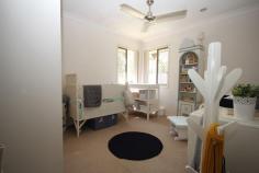 7 Okelly Court Collingwood Park QLD 4301 $329,000 BUSHLAND PEACE IN A CONVENIENT LOCATION Enjoy the peace of quiet of this home but still have great amenities on your doorstep. This neat and tidy home has great features for a home in this price range and should be added to you must see list. Your front entrance is discreetly located and attracts cooling breezes through the large entry and remainder of the house. The whole home is maintained with neutral features including the tiles, carpet and vertical drapes making it easy to stamp your style on it. The living area has beautiful high ceilings and flows out to a large covered outdoor area and easy to maintain yard. A roomy kitchen provides ample bench space and includes a dishwasher, pantry and breakfast bar and would be perfect when entertaining. There are 4 bedrooms with fans and built-in robes, while the main bedroom has a spliys system air-conditioner and an ensuite.