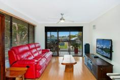 50 Jacaranda Avenue Two Heads West NSW 2485 Waterfront Home with Pontoon and Sandy Beach/ Boat Ramp Defined by a wonderful sense of understated waterfront location, this well presented home reveals a family environment as stylish as it is comfortable. It's enviably positioned within a level walk of cafes, shopping choices and a reserve next door. Keep the guests/teenagers or parents downstairs as it's a perfect get away or private work space. - Open plan design creates flexible living and dining spaces to enjoy sunrise and sunsets - Sliding doors open to all-weather alfresco sun washed entertaining spaces - Peaceful easy care back yard lined with scattered trees and gardens, pontoon and boat ramp - Granite/two pack finished kitchen, large pantry, gas stove top cooking and bonus water views - Three upper level bedrooms all have built in wardrobes, plus ground floor fourth with separate lounge area , bathroom and kitchenette - Master boasts a large window with water views and air-conditioning - Timber flooring upstairs, air conditioned lounge/dining - Downstairs easy care epoxy floor effect over concrete floors, bathroom with large tub to relax in after a day on the water - Large workshop/store room/internal entry to garage - Steps from leafy reserves, and bus stop nearby to Coolangatta beaches and Kingscliff Tafe -Solar hot water and power