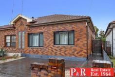 29 Edgbaston Rd Beverly Hills NSW 2209 $750K to $800K Close to station. 5 mins walk Ideally set opposite Edgbaston Reserve, this invitingly styled and tastefully updated period semi promises peace, privacy and light filled living space in abundance. With perfect proportions for family living and relaxed indoor /outdoor entertaining. 300m stroll to trains, shops, cinema and a variety of restaurants. Expansive open plan living with lounge area 4.8m x 4.3m and dining 3.4m x 4.1m (with skylight) extending fluidly through sliding glass doors to outside. Large level block with lush lawns and alfresco courtyard. Immaculately presented in contemporary neutral tones, ornate cornices, picture rails, recessed feature wall. Stylish kitchen equipped with stainless steel appliances- gas stove, dishwasher & pantry. Two oversized bedrooms PLLUS external bedroom/office/rumpus room (with air con). Internal laundry with separate toilet and 2nd shower. Renovated bathroom. Plentiful storage, timber flooring, and air conditioning. Double off-street parking. Close to schools, M5, Roselands Centro and short drive to Hurstville.