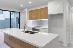 1062B Lakeview Terrace Benowa QLD 4217 $995,000 BRAND NEW 4 BEDROOM DUPLEX. ABSOLUTELY STUNNING. DOUBLE GARAGE. - BENOWA QLD This brand new duplex / semi-detached dwelling is within walking distance to toe shops this Situated behind security gates this ‘must see’ home consists of . Open plan living / dining downstairs – fully tiled which leads out to the large courtyard for entertaining . One Master bedroom with WIR and ultra modern ensuite – one upstairs . A further downstairs Master bedroom with WIR and ensuite overlooks courtyard . 2 further bedrooms upstairs . 3 bathrooms . Granite kitchen with S/S appliances . Stunning courtyard . Carpet upstairs . Very light and airy . Double garage . Airconditioned . Close to schools . Close to Pacific Fair & Robina Shopping Centres Property Features 4 bed 3 bath Air Conditioning Alarm System Built-In Wardrobes Close to Schools Close to Shops Garden Secure Parking Terrace/Balcony