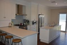 5 DAVID STREET Moree NSW 2400 $350,000 PRETTY AS A PICTURE! * 3 Bedrooms - built-ins + c/fans * Renovated bathroom * Open plan lounge, meals & kitchen * Compact laundry * Linen cupboard in hallway * Log tile fire, s/system & ducted evaporative cooling * Single carport * Lock-up shed with power (8m x 7m approx) * External office, guest room or playroom * Fully fenced rear yard * Double concrete parking bay off lane way - sliding gate * Easy maintenance immaculate lawns & gardens
