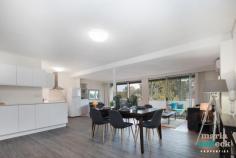1/6 HEARD STREET MAWSON ACT 2607 $305,000+ Recently Renovated Spacious Apartment Uncompromising style and space are showcased in this ground floor, sun-drenched apartment. Recent renovations have produced a spacious home offering open plan interiors, floating floorboards, a gorgeous combined bathroom and laundry, and reverse-cycle heating and cooling. The unique, wrap-around kitchen is sure to make a statement; cleverly utilising light and space it complements the home's contemporary renovations. From floor-to-ceiling windows the lounge and dining areas enjoy sunlight and views across the local tennis courts out towards Mount Taylor. Accommodation includes two bedrooms, both with built-in-robes, a private parking space and a lock up storage area. Conveniently located with Mawson shops at your doorstep and a short walk to local schools, tennis courts and public transport, this superb apartment is sure to impress. Ground floor apartment Stunning contemporary renovations throughout New floating floorboards New modern kitchen Lounge and dining with floor-to-ceiling windows Extended front balcony with tranquil views Gorgeous combined bathroom and laundry with floor-to-ceiling tiling Reverse-cycle heating and cooling Two bedrooms, both with built-in-robes Private parking space Lock up storage area Great location behind bustling Mawson shopping centre, with just a short walk to schools, tennis courts and public transport, and only a few minutes drive to Woden Plaza Exceptional opportunity for the savvy investor or first home buyer looking to enter the Canberra market