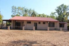 10 Gosport Road Girraween NT 0836 $500,000 Situated on 2 Ha (5 acre) corner lot with dual road frontage & fully fenced. • Featuring a fully coded 2 Bedroom plus studio 2 bathroom ground level masonry block home with approx 202 SQM under roof. • Ideal for the first home-buyer and fabulous location near Coolalinga & Humpty Doo shops. • Large lounge & separate dining areas. • Split air conditioned & fully tiled throughout • Enjoy the in-ground Spa to cool off on those hot monsoon days. • 2 Litres Per Second Bore • 6m x 4m Lean to shed with ablutions & Garden Sheds x 3 at rear of property. • Short drive to Golf Club, schools, shops, pub and Humpty Doo, Coolalinga or Palmerston shopping hubs. • Property yard and home needs some TLC And is ready for a new owner, suite first home buyer of tradesman. TO BE SOLD "AS IS WHERE IS CONDITION"