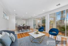 2/17 Lee Avenue Mount Waverley VIC 3149 Brand New Townhouse with Suburban Convenience Stunning contemporary design featuring spacious comfort, high ceilings, quality timber floors, tall windows, luxury fittings and a relaxed yet convenient lifestyle are the hallmarks of this sensational, brand new two level townhouse. Positioned in an enviable location within the Mount Waverley Secondary College School zone, this gem is literally metres to buses, trains, shops and eateries. Light filled, this double storey haven impresses with a generous lounge and dining zone along with a state of the art stone kitchen with stainless steel gas appliances, 5 burner cooker, deluxe window splash back, and an island bench with a dishwasher. The front study can be converted into an extra bedroom, offering options for a relaxing change of pace or a perfect spot to hustle and get things achieved. Neighbouring is a gorgeous lower level suite with a walk-in robe and a divine shower ensuite, while the upper master is spacious with a walk-in robe and ensuite and two further bedrooms with built-in robes. A pristine central bathroom boasts wall-to-wall shower and floating vanity and two powder rooms are a true treat. With fantastic outdoor entertaining options including an easy-to-manage courtyard and sun-drenched alfresco patio. This striking residence also comprises of a delectable sitting area, a large storage room under the stairs, a laundry, ducted heating, evaporative cooling, ducted vacuum and double remote garage with internal entry. In a superb location only seconds to Syndal train station, family amenities, restaurants, cafes, gymnastics and fitness centres, schools such as Huntingtower School, Wesley College, Mount Waverley Secondary College and Syndal South Primary along with the newly renovated The Glen shopping centre, Kingsway entertainment district and Cinemas.
