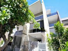 11 Helen Street Teneriffe QLD 4005 $1,500,000+ DOWNSIZE WITHOUT "DOWN" SIZING - TENERIFFE RESIDENCE. ELEVEN ON HELEN. Rarely do we find an inner city apartment with design elements as displayed in Eleven On Helen. There is a real architectural vision in this property resulting in generous open plan light filled interiors encased by glass walls opening to entertaining balconies capturing leafy street views. Discover lustrous stone flooring, rich timber veneer cabinetry and more glass enclosed outdoor living spaces as you move through the apartment. Flanking the formal dining space is a vast floating bench supporting the stainless steel Miele kitchen and glass splash backs. The Master Bedroom retreat is cocooned in a quiet space featuring an open design walk-in ensuite with island deep soak bath. An exceptional lifestyle property that delivers – 308 square meters of living on one level – 3 large built-in bedrooms – 2 bathrooms + guest powder room – Various outdoor balconies/living spaces – Master suite with separate parents’ retreat – 2 car lock up garage with storage – Secure lift access Live in the local village of Teneriffe with its array of coffee shops, restaurants, gyms and specialty shops. Only a short stroll to the City Cat ferry and City Glider bus service. Walk along the picturesque riverside boardwalk to New Farm park and the Powerhouse Performing arts centre. Only 20 min walk to the Brisbane CBD. Shop in the famous James Street precinct or around the corner is Gasworks Plaza. Features Air Conditioning Balcony Built In Robes Dishwasher Intercom Secure Parking