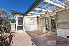 Unit 1/14 Shirley Ave Glen Waverley VIC 3150 $900,000 - $990,000 Prime Position & Picture Perfect Family Home Located in the highly coveted Glen Waverley Secondary College zone, with only minutes to walk to Wesley College and nestled in a quiet court offering absolute convenience, this picture perfect 4 bedroom + study and 2 bathroom home offers stunning family warmth you will find irresistible. The beauty of polished floorboards, generous ceiling heights and the comfort 4 bedrooms with robes and of respectable size are just a couple of the features that will impress, while other major highlights include a large lounge with open fire, timber themed kitchen with blackwood tops and quality stainless steel cooktop, a light and airy dining space with views to the courtyard, a dedicated study or 5th bedroom if needed and a large central bathroom with combined bath & shower and toilet. Enjoy the privacy and delight of the the rear paved courtyard with covered alfresco along with the comfort and convenience of ducted heating, reverse cycle cooling, solar electricity, separate laundry, toilet and 2nd shower and single carport. Only minutes to Wesley College and Syndal Station, it offers easy access to Glen Waverley Secondary College, Glendale Primary School, Glen Waverley Primary School, Bogong Reserve, The Glen Shopping Centre and local buses.