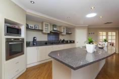 98 Carosa Rd Ashby WA 6065 $455,000 to $475,000 Just what a modern family needs 4 huge KING SIZED bedrooms with 3 of these with WIR's and the other with BIR's Plus a STUDY or 5th bedroom. With a HOME THEATRE room, a huge FAMILY and DINING rooms open plan to the commercial sized Kitchen one of the best designed and sized family homes to come onto the market. Internal store room, reversed cycle ducted air-conditioning. Double lock up garage, auto reticulation and a huge pitched PATIO for those family BBQ family gatherings, insulation and window tinting for those hot summer days. High position with VIEWS from the yard and PATIO to Joondalup. Don't miss seeing this one put it on your list price reduced! It should now fit into your budget and into your family lifestyle. Phone for a private viewing or call Graeme Thomson 0419 678 900.