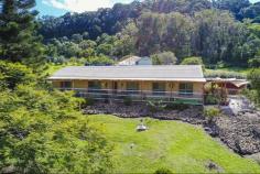 846 Hunchy Road HUNCHY QLD 4555 $499,000 Tree Change Lifestyle Property Are you looking for a property away from the hustle and bustle of everyday life yet still close to amenities? ‘Fox Glove Farm’ could be the property for you. Nestled neatly into the base of the hinterland with views to Coolum and surrounding coastline on 2.5 acres only 10 mins from Palmwoods. New carpets and fresh paint bring this home to life. 3 bedrooms with an option for a 4th with the tastefully converted garage. The master bedroom with walk through robe and ensuite offers air conditioning for your convenience. The home also features separate lounge and dining areas and a good size bathroom with separate toilet and functional laundry. The kitchen is neat and tidy and features a high quality Italian imported combustion stove with electric option. This system also runs the hot water meaning you never run out. Off the kitchen is a good size patio with plenty of room for barbequing and entertaining. Add to that the continued wrap around veranda allowing you to enjoy the afternoon breezes, this home has all the features you need to move right in and enjoy the peace and quiet. Key Features • Ocean views • Fireplace • Air conditioning • New paint and carpets • 35,000L water • Italian slow combustion stove • Vintage Rose Garden • 2.5 acres • 2 car accommodation • Garden Shed • 10 mins to Palmwoods • 10 mins to Montville • 20 mins to Bruce Highway • 30 mins to beach