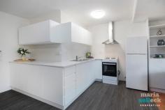 1/6 HEARD STREET MAWSON ACT 2607 $305,000+ Recently Renovated Spacious Apartment Uncompromising style and space are showcased in this ground floor, sun-drenched apartment. Recent renovations have produced a spacious home offering open plan interiors, floating floorboards, a gorgeous combined bathroom and laundry, and reverse-cycle heating and cooling. The unique, wrap-around kitchen is sure to make a statement; cleverly utilising light and space it complements the home's contemporary renovations. From floor-to-ceiling windows the lounge and dining areas enjoy sunlight and views across the local tennis courts out towards Mount Taylor. Accommodation includes two bedrooms, both with built-in-robes, a private parking space and a lock up storage area. Conveniently located with Mawson shops at your doorstep and a short walk to local schools, tennis courts and public transport, this superb apartment is sure to impress. Ground floor apartment Stunning contemporary renovations throughout New floating floorboards New modern kitchen Lounge and dining with floor-to-ceiling windows Extended front balcony with tranquil views Gorgeous combined bathroom and laundry with floor-to-ceiling tiling Reverse-cycle heating and cooling Two bedrooms, both with built-in-robes Private parking space Lock up storage area Great location behind bustling Mawson shopping centre, with just a short walk to schools, tennis courts and public transport, and only a few minutes drive to Woden Plaza Exceptional opportunity for the savvy investor or first home buyer looking to enter the Canberra market