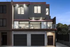 97A Tennyson Street Essendon VIC 3040 $849,000 Opposite Montgomery Reserve, this new, two bedroom townhouse spans three chic levels to deliver the ultimate living experience for the trendsetter. Designed for entertaining, the spacious open living domain spills seamlessly to an expansive balcony taking in extraordinary city views. The chef's kitchen is draped in Caesarstone and flaunts high end Miele appliances. Double bedrooms (mirrored BIRs), one also with study nook, enjoy the same impressive panorama and share a deluxe fully tiled bathroom. Among a long list of superb extras are split systems in main rooms, powder room (second toilet), high ceilings, alarm, video intercom and extra tall remote garage. A stroll to cafes, Pascoe Vale Road tram and Moonee Ponds Creek Trail, it's also zoned for Strathmore College. It's a sure thing for savvy professionals and investors.