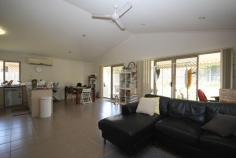 7 Okelly Court Collingwood Park QLD 4301 $329,000 BUSHLAND PEACE IN A CONVENIENT LOCATION Enjoy the peace of quiet of this home but still have great amenities on your doorstep. This neat and tidy home has great features for a home in this price range and should be added to you must see list. Your front entrance is discreetly located and attracts cooling breezes through the large entry and remainder of the house. The whole home is maintained with neutral features including the tiles, carpet and vertical drapes making it easy to stamp your style on it. The living area has beautiful high ceilings and flows out to a large covered outdoor area and easy to maintain yard. A roomy kitchen provides ample bench space and includes a dishwasher, pantry and breakfast bar and would be perfect when entertaining. There are 4 bedrooms with fans and built-in robes, while the main bedroom has a spliys system air-conditioner and an ensuite.