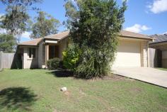7 Okelly Court Collingwood Park QLD 4301 $329,000 BUSHLAND PEACE IN A CONVENIENT LOCATION Enjoy the peace of quiet of this home but still have great amenities on your doorstep. This neat and tidy home has great features for a home in this price range and should be added to you must see list. Your front entrance is discreetly located and attracts cooling breezes through the large entry and remainder of the house. The whole home is maintained with neutral features including the tiles, carpet and vertical drapes making it easy to stamp your style on it. The living area has beautiful high ceilings and flows out to a large covered outdoor area and easy to maintain yard. A roomy kitchen provides ample bench space and includes a dishwasher, pantry and breakfast bar and would be perfect when entertaining. There are 4 bedrooms with fans and built-in robes, while the main bedroom has a spliys system air-conditioner and an ensuite.