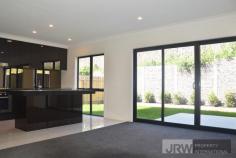 82 AMADEO WAY CHIRNSIDE PARK VIC 3977 Brand New Residence in the Heart of Chirnside Park A brand new ultra-modern three bedroom residence has become available and is perfect for couples, downsizing, first home buyers and investors alike! Located within the community of The Gardens in the heart of Chirnside Park, this two storey residence features generous sized bedrooms, a secure single garage and a private garden area with shed storage. Features Include - Large open gourmet kitchen featuring mirrored splash backs, stone benchtops, wood finished cabinetry, quality stainless steel appliances, natural gas cook top, electric oven, dishwasher and an abundance of cupboard space - Three incredibly spacious bedrooms, two with built-in wardrobes and the master with walk-in wardrobe and stunning full ensuite - Bathrooms complete with quality stone bench tops, hand-crafted designer vanities and a guest powder room - Spacious open plan living area downstairs leading to a private landscaped back garden - High ceilings, large windows and glass sliding doors maximizing natural light - Air Conditioning and Gas Ducted Heating Throughout - Single remote garage - European Laundry - NBN ready fittings This stunning property is located at the footsteps of the Yarra Valley with its plentiful wineries and attractions, yet offers absolute convenience with all the amenities Chirnside Park provides with shops and schools only moments away from home!