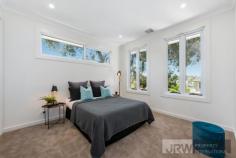 2/17 Lee Avenue Mount Waverley VIC 3149 Brand New Townhouse with Suburban Convenience Stunning contemporary design featuring spacious comfort, high ceilings, quality timber floors, tall windows, luxury fittings and a relaxed yet convenient lifestyle are the hallmarks of this sensational, brand new two level townhouse. Positioned in an enviable location within the Mount Waverley Secondary College School zone, this gem is literally metres to buses, trains, shops and eateries. Light filled, this double storey haven impresses with a generous lounge and dining zone along with a state of the art stone kitchen with stainless steel gas appliances, 5 burner cooker, deluxe window splash back, and an island bench with a dishwasher. The front study can be converted into an extra bedroom, offering options for a relaxing change of pace or a perfect spot to hustle and get things achieved. Neighbouring is a gorgeous lower level suite with a walk-in robe and a divine shower ensuite, while the upper master is spacious with a walk-in robe and ensuite and two further bedrooms with built-in robes. A pristine central bathroom boasts wall-to-wall shower and floating vanity and two powder rooms are a true treat. With fantastic outdoor entertaining options including an easy-to-manage courtyard and sun-drenched alfresco patio. This striking residence also comprises of a delectable sitting area, a large storage room under the stairs, a laundry, ducted heating, evaporative cooling, ducted vacuum and double remote garage with internal entry. In a superb location only seconds to Syndal train station, family amenities, restaurants, cafes, gymnastics and fitness centres, schools such as Huntingtower School, Wesley College, Mount Waverley Secondary College and Syndal South Primary along with the newly renovated The Glen shopping centre, Kingsway entertainment district and Cinemas.