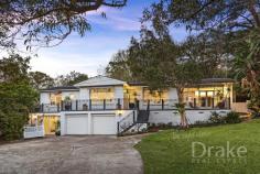 12 Kalang Road Elanora Heights NSW 2101 $1,900,000 Solid as a rock and full of light this home is a gracious classic From the moment you step inside the entry foyer you'll be drawn right into the generous living areas with their incredible sense of space and warmth. There is an abundance of natural light throughout the entire home. The expansive design is so versatile and would suit larger families, those with older children or those needing separate work or living accommodation within the one home - this home offers plenty of space for everyone! Accommodation is more than ample featuring four well proportioned bedrooms, all with built-ins; a separate study; two bathrooms - one with separate WC. The kitchen boasts under floor heating, gas cooktop and electric oven, a dishwasher and breakfast bar for meals on the go. Downstairs you'll find a large rumpus with wet bar adjoining the garages. But it's the living areas and near floor to ceiling glass walled dining area overlooking the impressively landscaped rear yard that really captures one's imagination. With the beautiful light, the hues of the magnificent sandstone features and the charm of the sunlit garden area just beyond this could easily become the perfect art studio. On a huge 1375 square metres outdoor entertaining is a breeze. There is plenty of space for the children to play or, more simply, for yourself to simply enjoy some space and privacy…your own space. Full double brick throughout with tile roof, the house is very solid and offers double car garaging with internal entry plus a workshop and miles of storage. From the high side of the street looking due east out to the ocean beyond and positioned an easy 400m stroll to the 'top shops', footsteps to the express bus, an easy walk to and within the local school catchment this is a sought-after lifestyle location.